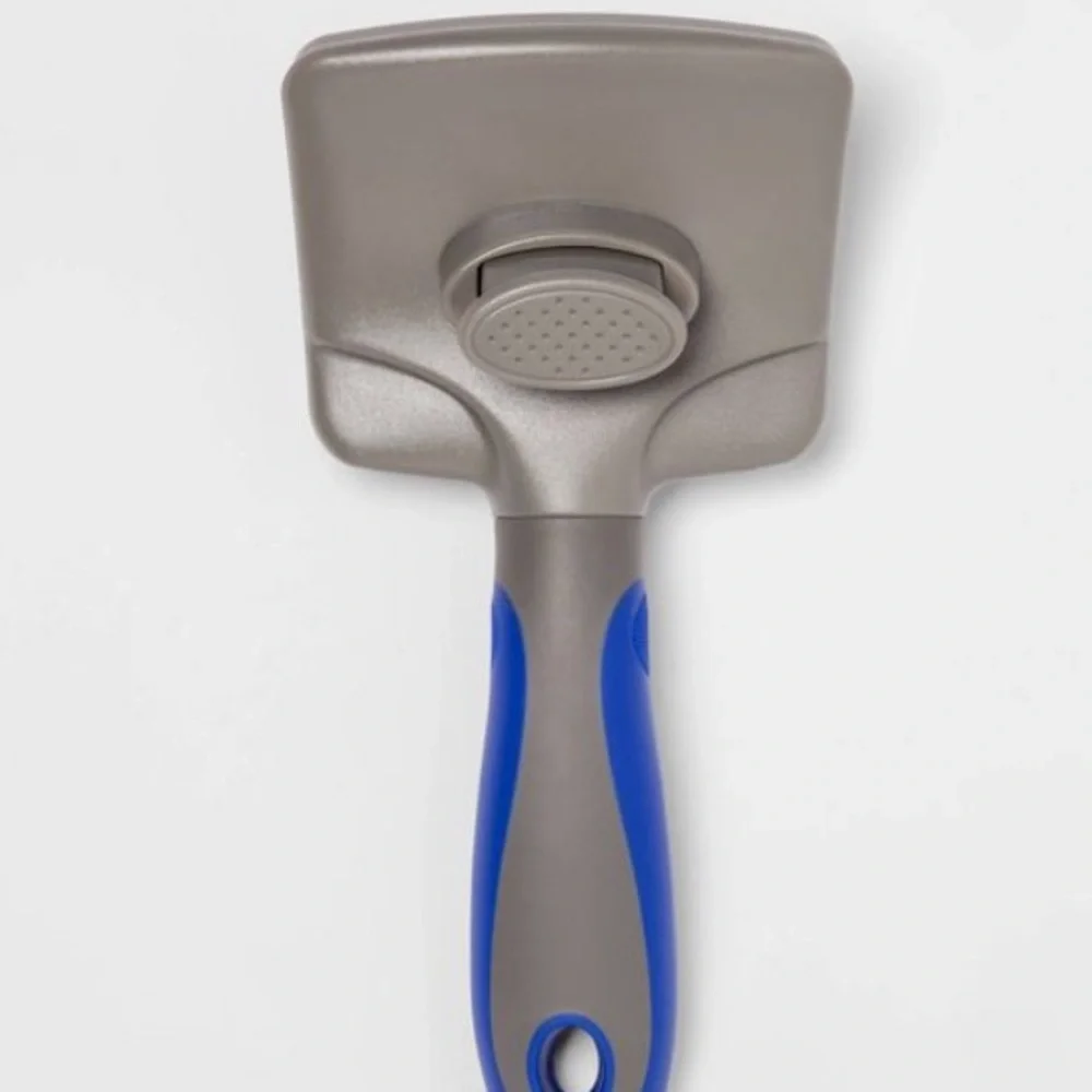 Pet grooming brush